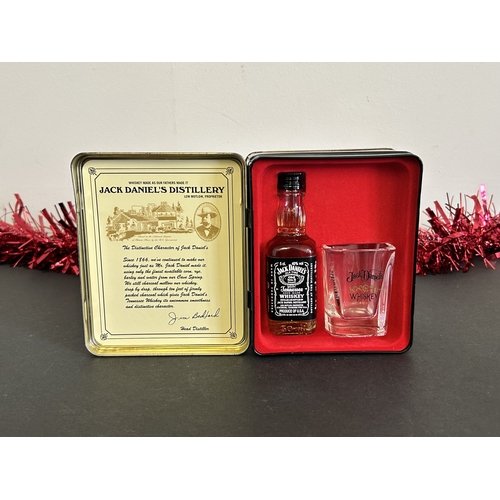 12 - A boxed Jack Daniels Old No.7 Brand Whisky set of a miniature 5cl bottle together with a shot glass