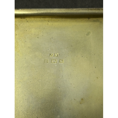 136 - A hallmarked silver and blue enamel cigarette case, just over 3