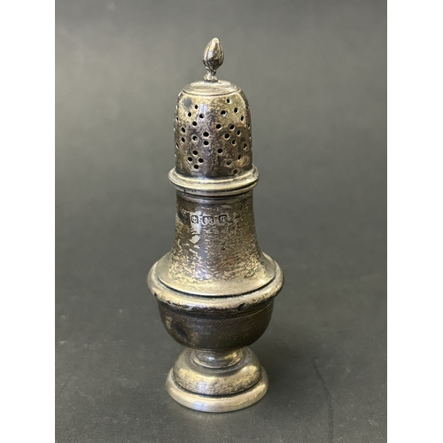 148 - A hallmarked silver pepperette, weight approx. 25g (a few dents)