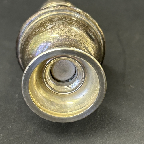 148 - A hallmarked silver pepperette, weight approx. 25g (a few dents)
