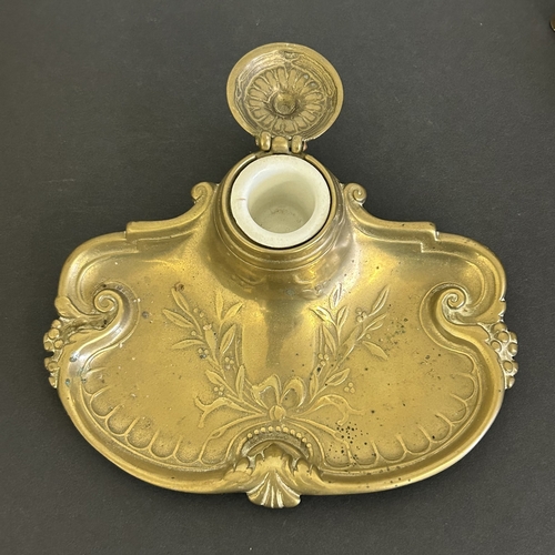 223 - Two brass letter racks, one in an Art Nouveau style plus silver plated boxes, brass inkwell etc