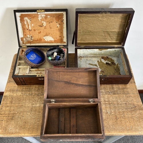 246 - An Edwardian inlaid sewing box with contents together with two other wooden boxes