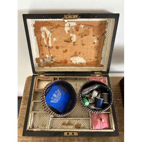 246 - An Edwardian inlaid sewing box with contents together with two other wooden boxes