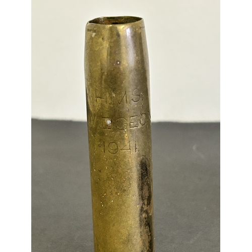 304 - A 'Dodo Design Ltd' sign with German writing, an anti dimming kit for a gas mask, a 37mm case, a 50t... 