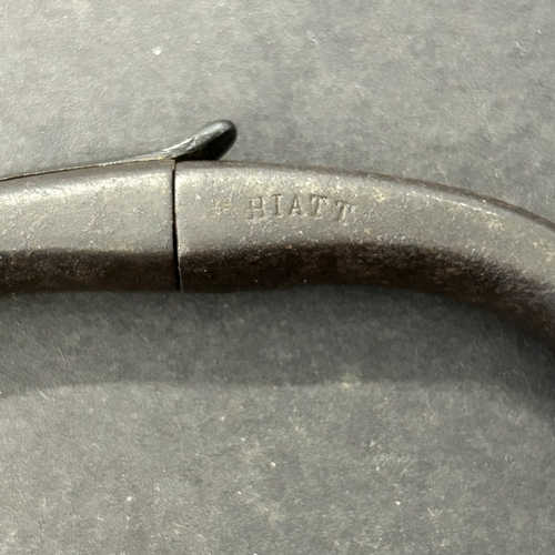308 - A pair of Victorian 'come-along' style handcuffs as used by Victorian Police, made by Hiatt & Co Bir... 