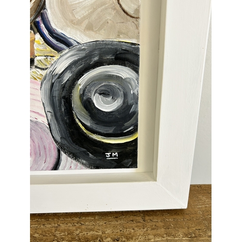 425 - A white framed oil on board 'Hat Stall', monogrammed J M and dated 2014, frame size 18 1/4