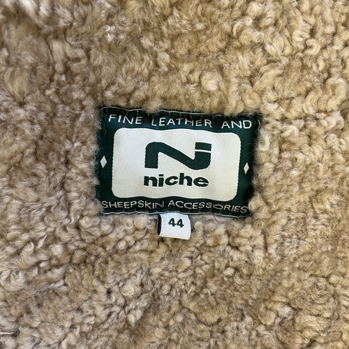 494 - A vintage 'Niche' fine leather and sheepskin style flying jacket, size 44 (age use)
