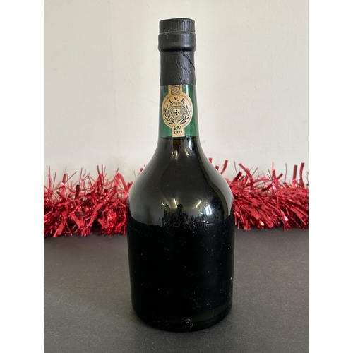 59 - A 1974 bottle of Croft Port Distinction, Aged for 10 Years in Wood, 26 2/3 fl oz