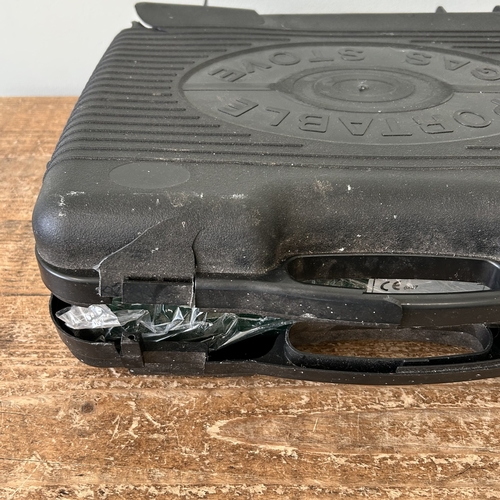 442 - A portable gas stove (appears unused, case as found)