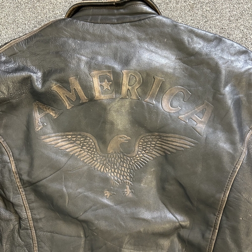 429 - A vintage 'Akaso' black leather flying/biker jacket, the back with 'America' and an eagle under, Ind... 