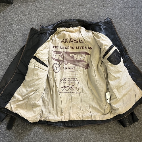 429 - A vintage 'Akaso' black leather flying/biker jacket, the back with 'America' and an eagle under, Ind... 