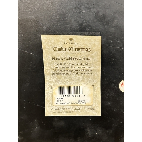 418 - A decorative 'Past Times' red and gold coloured dome top box on four gilded feet, approx. 15 1/2