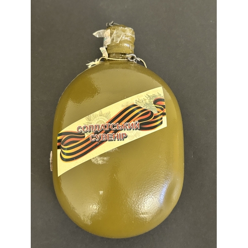 419 - A Ukrainian souvenir water bottle in pouch plus a WW2 British water bottle (both as found)