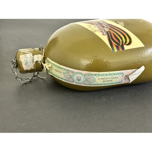 419 - A Ukrainian souvenir water bottle in pouch plus a WW2 British water bottle (both as found)