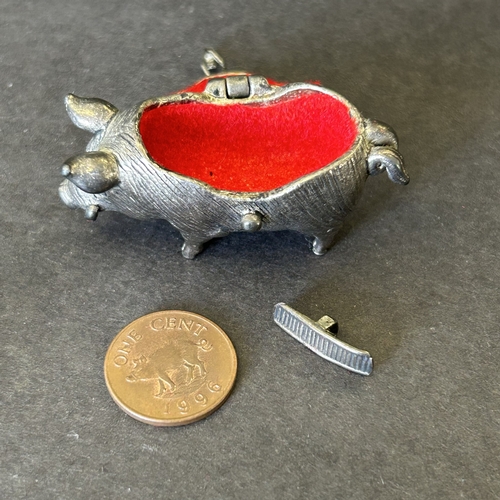106 - Various vintage mini pig figures including a 925 sterling silver former vesta, white metal with lid,... 