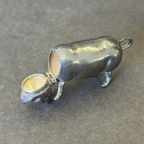 106 - Various vintage mini pig figures including a 925 sterling silver former vesta, white metal with lid,... 