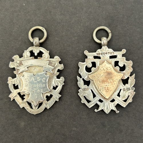 115 - Two hallmarked silver swimming prize fob medals, both named to G Rose, circa 1901/02, combined weigh... 