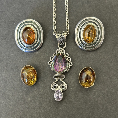 123 - A 925 sterling silver and amethyst colour stone set pendant on a 925 chain together with two pairs o... 