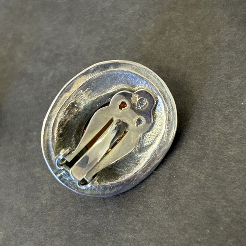 123 - A 925 sterling silver and amethyst colour stone set pendant on a 925 chain together with two pairs o... 