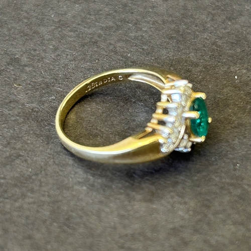 129 - An 18ct gold diamond and green stone ring, approx. size N, weight approx. 3.6g