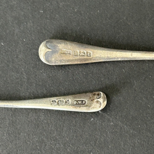 145 - A pair of hallmarked silver salts with blue glass liners together with two hallmarked silver salt sp... 