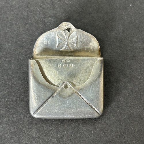 151 - A hallmarked silver cigar piercer together with a silver and enamel stamp case, combined weight appr... 