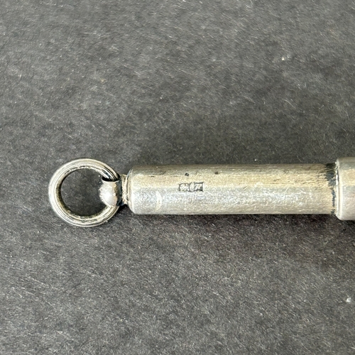 151 - A hallmarked silver cigar piercer together with a silver and enamel stamp case, combined weight appr... 