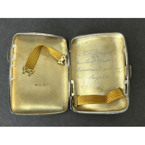 152 - A hallmarked silver small cigarette case with internal inscription for 1911, weight approx. 62g