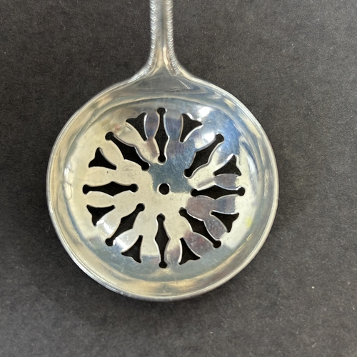165 - A matching pair of hallmarked silver small ladle and sifting spoon, same maker, one marked for Birmi... 