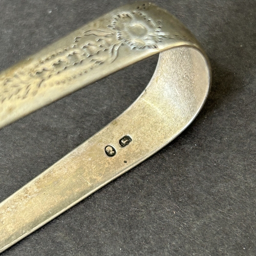 167 - Hallmarked 19th Century silver tongs together with a single silver spoon and a Georgian mustard spoo... 