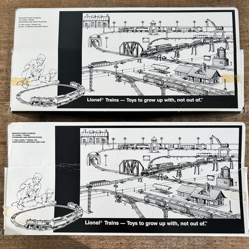 21 - Two boxed vintage Lionel trucks
