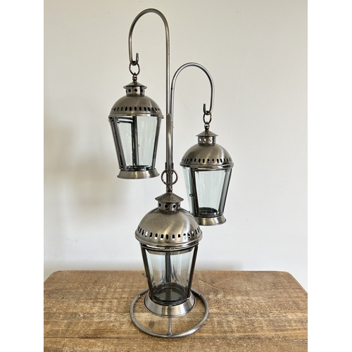 222 - Three staggered height tealight lantern, approx. 25
