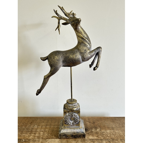 225 - A resin model of a leaping deer, approx. 22