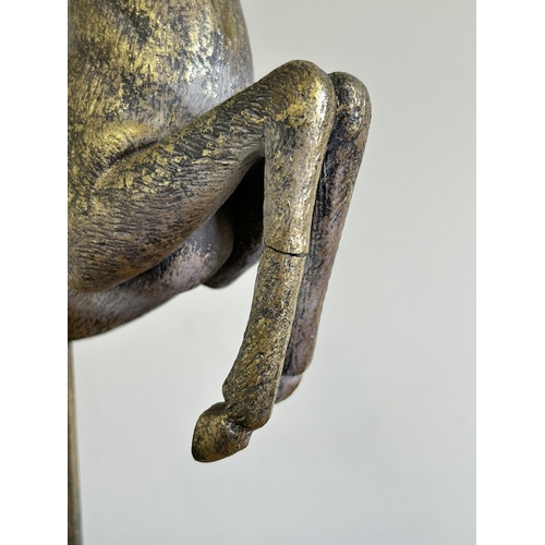 225 - A resin model of a leaping deer, approx. 22