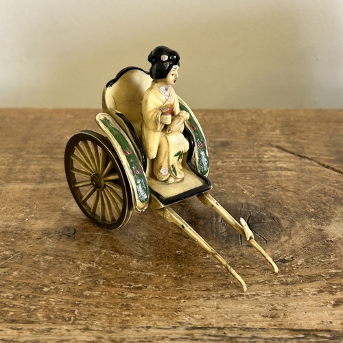 23 - A vintage Japanese porcelain tea set with hand painted decoration in a 12 setting including a teapot... 