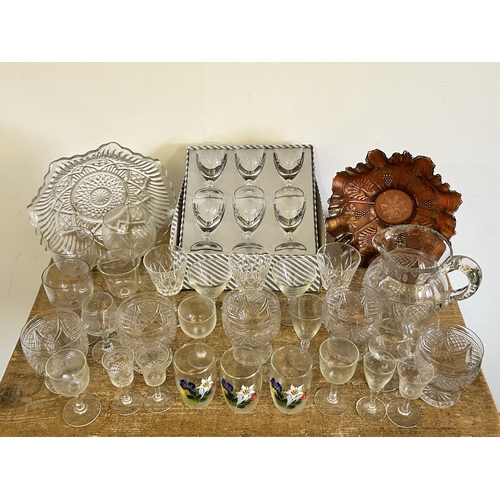 247 - A box of mixed glassware including a cut glass jug, drinking glasses and dishes