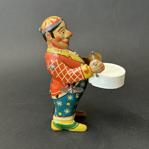 255 - A mid Century German tin plate key wind drummer, approx. 4 3/4
