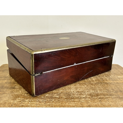 26 - An antique brass banded writing slope with secret drawer, 17 3/4