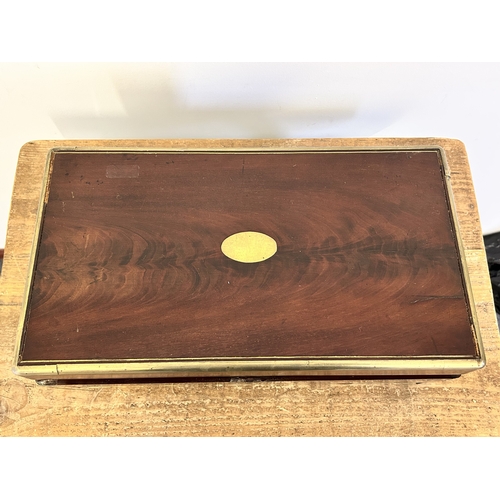 26 - An antique brass banded writing slope with secret drawer, 17 3/4