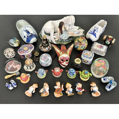 265 - A figurine of a girl with a unicorn, small decorative boxes, miniature shoes, Tetley Tea miniature t... 