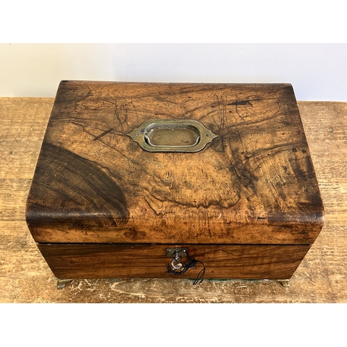 27 - An antique wooden work box with brass handles, approx. 11 3/4