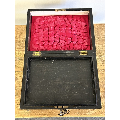 27 - An antique wooden work box with brass handles, approx. 11 3/4