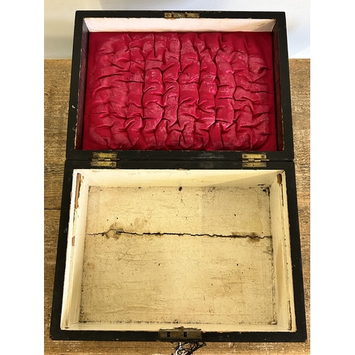 27 - An antique wooden work box with brass handles, approx. 11 3/4