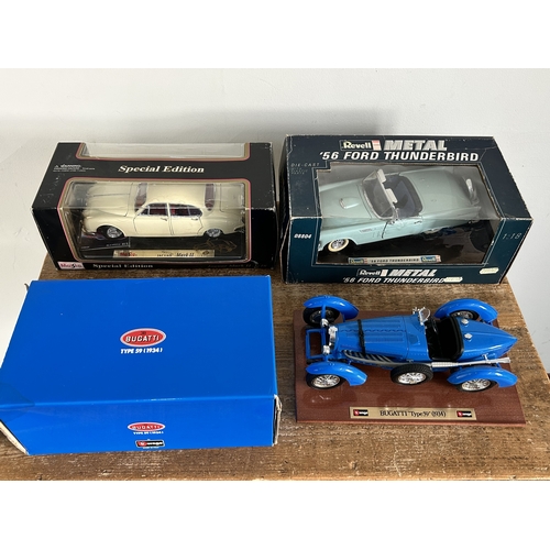 295 - A boxed Revell metal '56 Ford T Bird 1:18 scale together with a Maisto Jaguar and a Burago Bugatti (... 