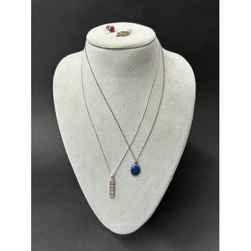 308 - A sterling silver blue stone locket on chain together with a sterling chain with pendant, a 925 four... 