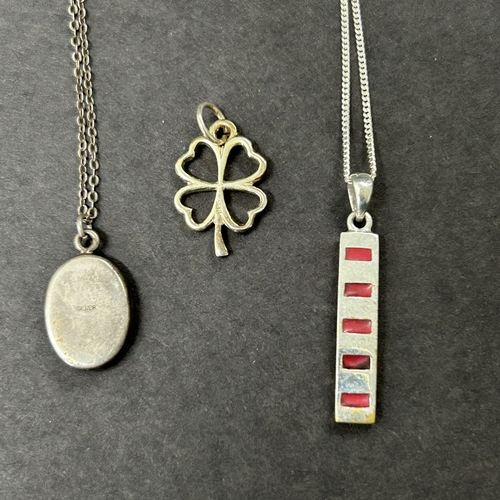 308 - A sterling silver blue stone locket on chain together with a sterling chain with pendant, a 925 four... 