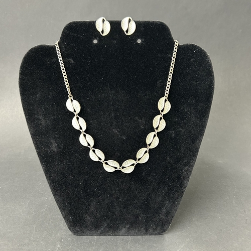 323 - A pair of 925 sterling silver Norwegian made clip-on earrings together with a matching but unmarked ... 