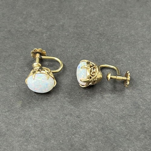 326 - A 9ct gold and opal set ring, approx. size O, weight approx. 2.2g (the shank has been cut) together ... 