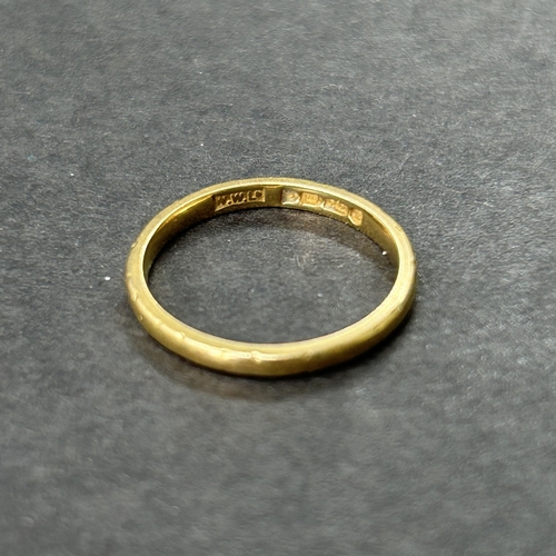 342 - A 22ct gold wedding band, approx. size M, weight approx. 2.7g (edge knocks)