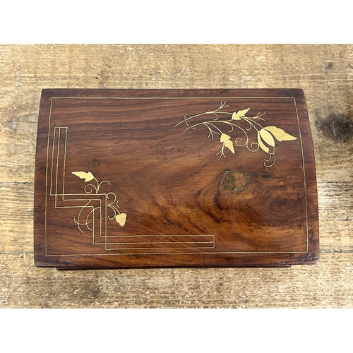 343 - A vintage brass inlaid jewellery box with secret opening together with a vintage leather covered exa... 